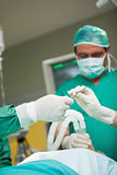 Surgeons holding a scalpel