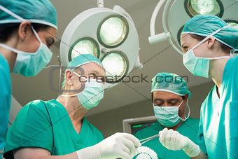 Surgeon team working together