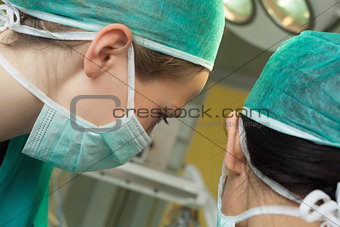 Two women surgeons