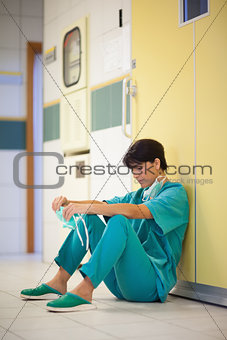 Woman surgeon sitting