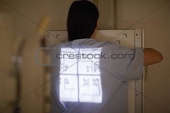 Radiography being done on a patient