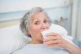 Elderly patient drinking