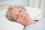 Patient sleeping on a medical bed