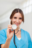 Smiling nurse holding a stethoscope