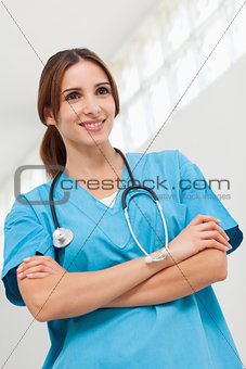 Nurse folding her arms and smiling