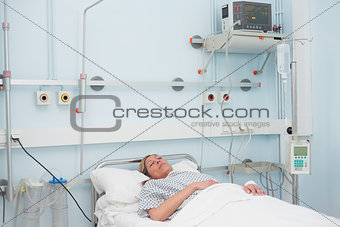 Female patient lying on a bed
