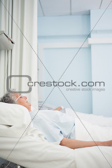 Patient lying on a medical bed