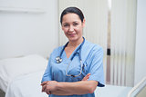 Nurse standing with crossed arms