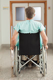 Male patient sitting in a wheelchair