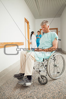 Patient in a wheelchair closing eyes