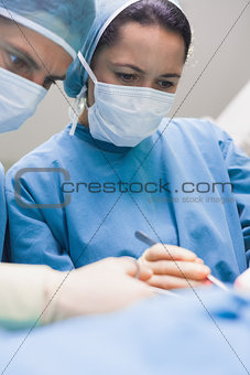 Doctor looking at a patient seriously