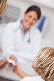 Focus on a child holding a prescription