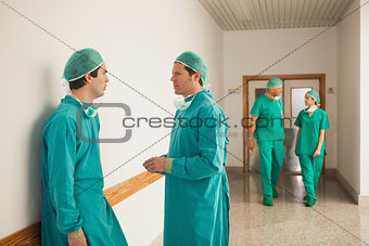 Surgeons speaking in the corridor