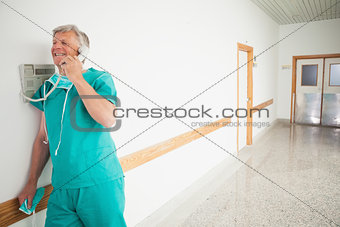 Surgeon holding a phone