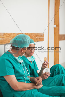 Surgeons eating biscuits