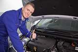 Smiling mechanic with his thumb up
