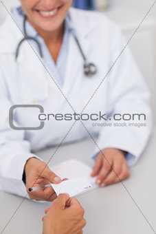 Doctor giving a paper