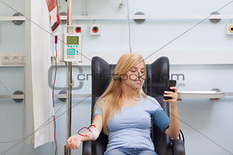 Woman receiving a blood transfusion