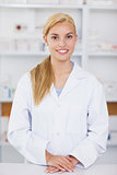 Blonde pharmacist smiling