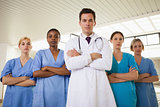 Doctor and nurses with arms crossed