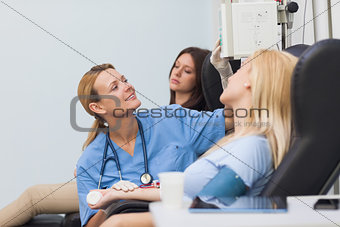 Nurse touching at the monitor
