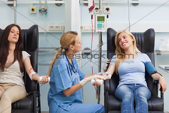 Nurse speaking with a patient