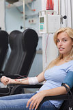 Female patient receiving a transfusion