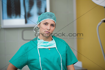 Serious nurse looking at camera