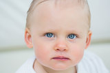 Close up of a baby looking at camera