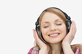 Woman smiling while listening music