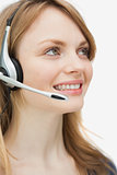 Close up of a woman with headset smiling