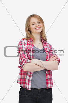 Front view of a woman smiling while standing