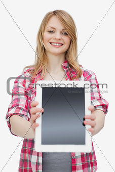 Woman showing a tablet computer
