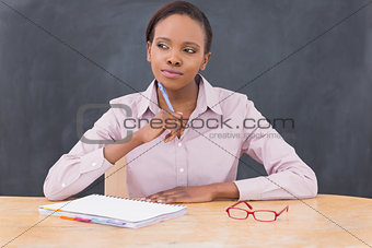 Teacher looking away while thinking 