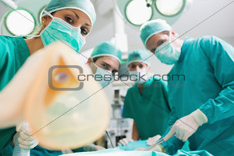 Anesthesia mask holding by a nurse