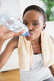 Close up of a black woman drinking