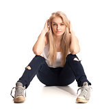 Blond teenage girl sitting