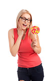 Portrait of surprised girl with big lollipop