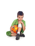 Boy with injured leg and soccer ball
