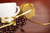 Coffee cup with yellow ribbon
