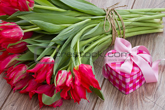 bouquet of tulips with present box