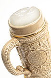 Traditional beer mug with froth, isolated