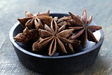 Stars anise on a wood   plate