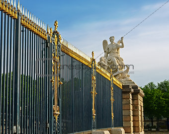 Sculpture fence Royal Palace in Versailles.