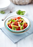 Penne pasta with roasted cherry tomatoes and capers