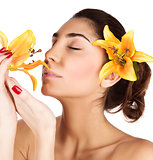 Girl enjoy lily flower smell