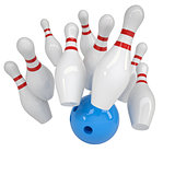 Blue ball knocks down pins for bowling