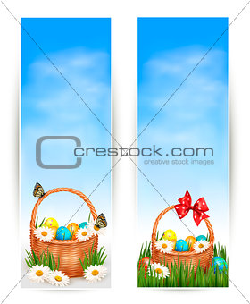 Easter banners with Easter eggs in basket and flowers. Vector