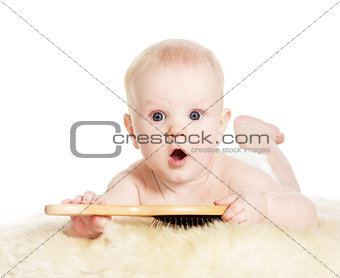 Baby boy with brush