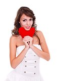 Attractive young woman with red heart
